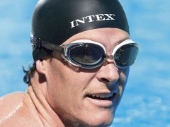 What details should be considered when purchasing swimming goggles